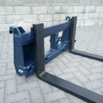 Pallet forks for tractor loader with conus II bushes for bale spikes