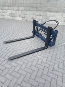Pallet fork set with hydraulic shift