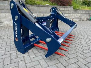 Round bale cutter for tractor loader and telehandler